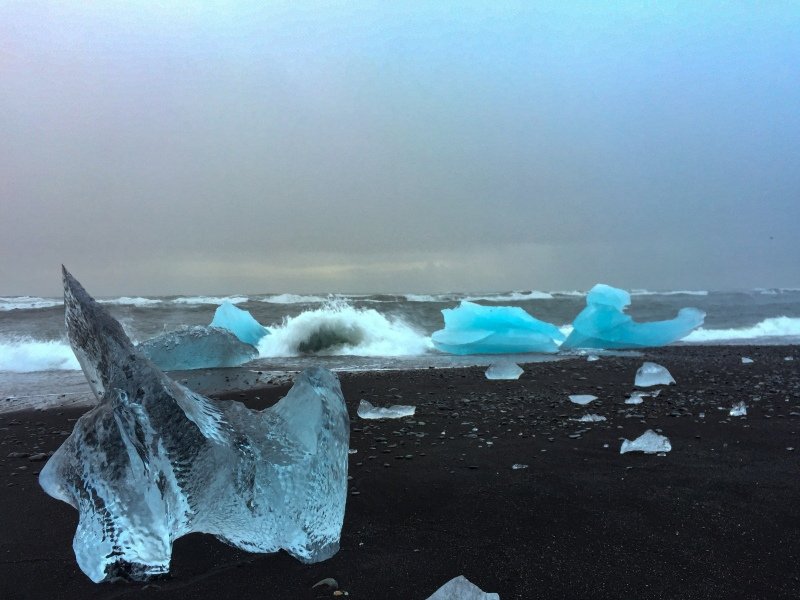 Some of the icebergs are washed up on the black sandy beach, beautiful and mystical
