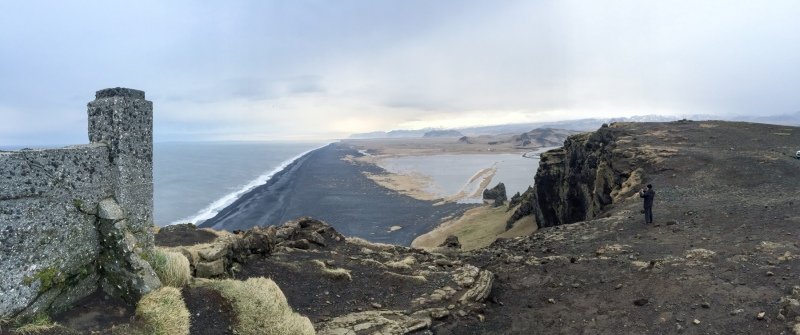 View from Dyrhólaey lighthouse along the black sandy coast towards Selfoss