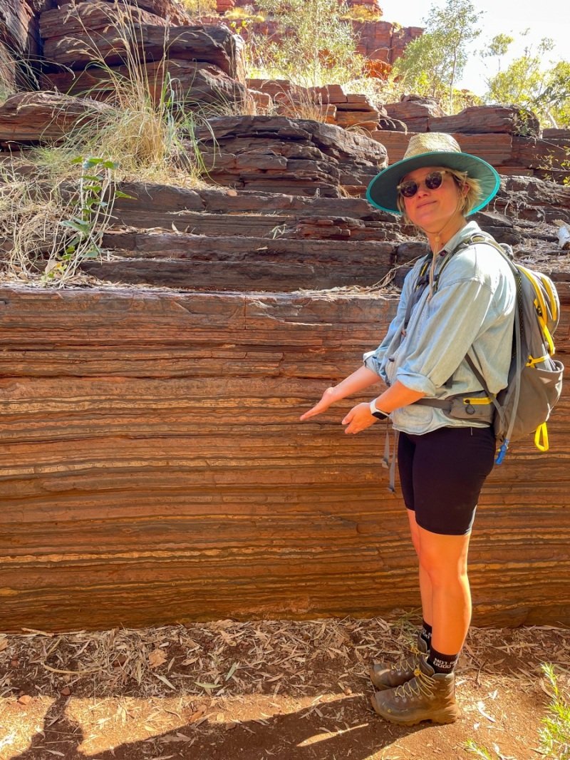 Anna pointing out asbestos at Dales Gorge, Karijini